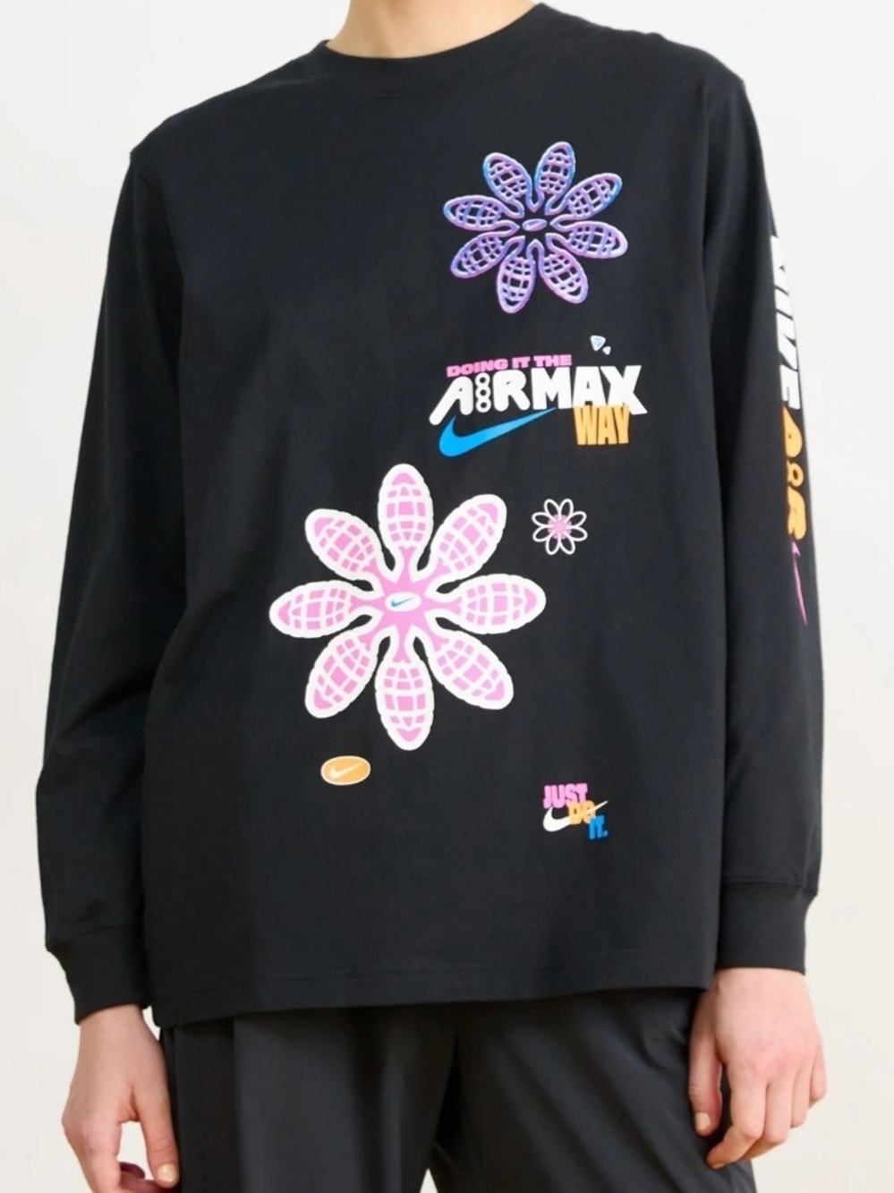 Nike Black Long-Sleeve Graphic Tee with Pink & Purple Floral Accents